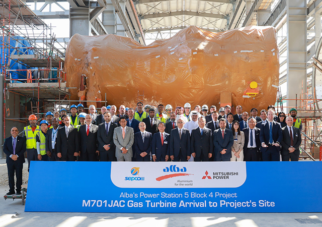 Officials mark the arrival of Mitsubishi Power’s gas turbine at the Alba site.